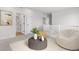 Cozy loft area with neutral decor, comfortable seating and abundant natural light at 8028 Williams Fork Ave, Littleton, CO 80125