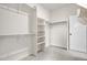 Spacious walk-in closet with ample shelving and hanging space for organized storage at 8028 Williams Fork Ave, Littleton, CO 80125