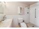 Bright bathroom with a tile shower, single sink, and standard toilet for a simple and functional design at 745 S Alton Way # 9B, Denver, CO 80247