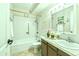 Clean bathroom featuring a shower/tub combination and updated vanity at 745 S Alton Way # 9B, Denver, CO 80247