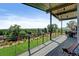 Enjoy panoramic views from this spacious deck, ideal for outdoor dining and lounging at 10106 W 69Th Pl, Arvada, CO 80004