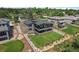 Aerial view showcases the home's unique design, lush landscaping, and serene neighborhood setting at 10106 W 69Th Pl, Arvada, CO 80004