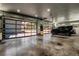Large garage with glass paneled doors allowing natural light, and space for multiple vehicles at 10106 W 69Th Pl, Arvada, CO 80004