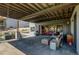 Spacious garage with stylish seating area, a grill, and an abundance of storage at 10106 W 69Th Pl, Arvada, CO 80004