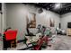 Home gym features workout equipment and a laundry area at 10106 W 69Th Pl, Arvada, CO 80004