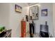 Stylish powder room features a pedestal sink, unique artwork, and decorative details at 10106 W 69Th Pl, Arvada, CO 80004