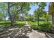 Scenic backyard with stone patio and abundant foliage at 11510 Lewistown St, Commerce City, CO 80022