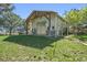 Picture of a barn with exposed timber details and a well-manicured lawn at 11510 Lewistown St, Commerce City, CO 80022