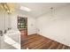 Bright bathroom with wood floors, dual vanity and skylights at 11510 Lewistown St, Commerce City, CO 80022
