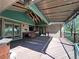 Spacious outdoor deck with a built-in bar area, perfect for entertaining with stunning views at 11510 Lewistown St, Commerce City, CO 80022