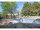 Backyard pool with deck, patio and lounge chairs, perfect for outdoor relaxation at 11510 Lewistown St, Commerce City, CO 80022