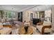 Open floor plan connecting the living room, dining area, and kitchen, creating an inviting and spacious atmosphere at 805 Elm St, Denver, CO 80220