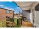 Inviting balcony with bistro set and grill, perfect for outdoor dining at 1265 Race St # 203, Denver, CO 80206