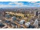 Expansive city view showcasing residential and commercial buildings, and greenery at 1265 Race St # 203, Denver, CO 80206