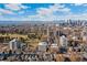 Breathtaking aerial view of Denver skyline with mountains in the distance at 1265 Race St # 203, Denver, CO 80206