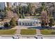 Aerial view of a colonnaded building surrounded by trees and landscaping at 1265 Race St # 203, Denver, CO 80206
