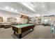 Recreational space featuring a pool table, couches, and exercise equipment at 1265 Race St # 203, Denver, CO 80206