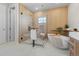 Modern bathroom featuring a glass-enclosed shower, soaking tub, and elegant fixtures at 10525 Sunshower Pl, Highlands Ranch, CO 80126