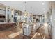 Spacious kitchen featuring a large island, modern appliances, and an open floor plan at 10525 Sunshower Pl, Highlands Ranch, CO 80126