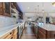 Modern kitchen featuring sleek countertops, high-end appliances, and seamless design elements at 10525 Sunshower Pl, Highlands Ranch, CO 80126