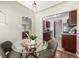 Dining room open to the kitchen and living room, creating an inclusive atmosphere at 1635 Poplar St, Denver, CO 80220