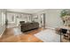 Spacious living room showcases hardwood floors, a neutral color scheme, and stylish decor at 1635 Poplar St, Denver, CO 80220