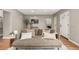 Living room showcasing a plush sofa with decorative pillows and neutral color palette at 1635 Poplar St, Denver, CO 80220