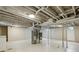 Large unfinished basement with exposed ceiling and mechanicals at 5645 W 5Th Ave # 5645 & 5655, Lakewood, CO 80226