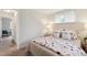 Comfortable bedroom with a queen-size bed and closet access at 5645 W 5Th Ave # 5645 & 5655, Lakewood, CO 80226