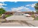 Charming duplex with brick exterior, driveway, garage, and well-maintained lawns, perfect for comfortable living at 5645 W 5Th Ave # 5645 & 5655, Lakewood, CO 80226
