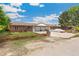 Charming brick home with well-maintained landscaping, featuring an attached two-car garage at 5645 W 5Th Ave # 5645 & 5655, Lakewood, CO 80226