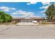 Charming brick home with well-maintained landscaping, featuring an attached two-car garage at 5645 W 5Th Ave # 5645 & 5655, Lakewood, CO 80226