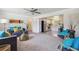 Inviting living room with plush seating, opening to a bright kitchen, perfect for modern living at 5645 W 5Th Ave # 5645 & 5655, Lakewood, CO 80226