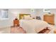 Cozy bedroom with a comfortable bed, stylish furnishings, and ample natural light at 1226 Dexter St, Denver, CO 80220