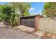 Spacious two-car garage with a sturdy brick exterior, offering secure parking and additional storage space at 1226 Dexter St, Denver, CO 80220