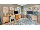 Comfortable home office featuring dual workstations, stylish decor, and natural light at 1226 Dexter St, Denver, CO 80220
