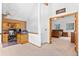 Bright office space with built-in wooden desk and shelving with deer mount at 10747 Timothys Dr, Conifer, CO 80433