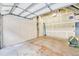 Spacious two car garage with metal flooring, ample lighting, and storage capabilities at 1745 Wazee St # 2B, Denver, CO 80202