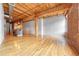 Bright and spacious living room featuring an open layout and a blend of modern & brick elements at 1745 Wazee St # 2B, Denver, CO 80202