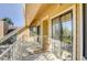 Balcony view with sliding door entrance and white railing at 5950 Gunbarrel Ave # F, Boulder, CO 80301