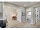 Open concept living room featuring dining, kitchen and partial view of the bedroom at 5950 Gunbarrel Ave # F, Boulder, CO 80301