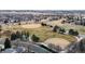 Aerial view of neighborhood baseball fields, park, and nearby homes at 3206 Columbine Ct, Broomfield, CO 80020