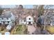 Aerial view of the home's backyard, showcasing the patio, trees, and privacy fencing at 3206 Columbine Ct, Broomfield, CO 80020