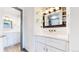 Elegant bathroom with a white vanity, bronze hardware, and modern lighting at 3206 Columbine Ct, Broomfield, CO 80020