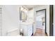 Clean bathroom with a white vanity and modern lighting at 3206 Columbine Ct, Broomfield, CO 80020