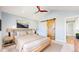 Relaxing bedroom featuring light blue walls and a light-colored wooden bed frame at 3206 Columbine Ct, Broomfield, CO 80020