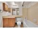 Bathroom features tile flooring, vanity, and shower-tub combination at 922 S Dearborn Way # 8, Aurora, CO 80012