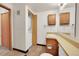 Bathroom featuring vinyl floors, updated lighting and a stackable washer and dryer at 922 S Dearborn Way # 8, Aurora, CO 80012