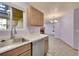 Modern kitchen with stainless steel appliances and view into dining and living areas at 922 S Dearborn Way # 8, Aurora, CO 80012