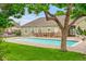 Community pool framed by lush greenery, offering a refreshing amenity at 922 S Dearborn Way # 8, Aurora, CO 80012